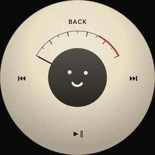 The VU meter wheel: a backlit cream dial with a needle.